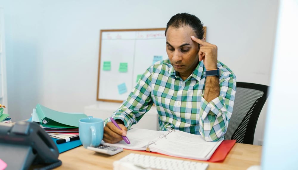 business owner thinking over decision business owner thinking over decision