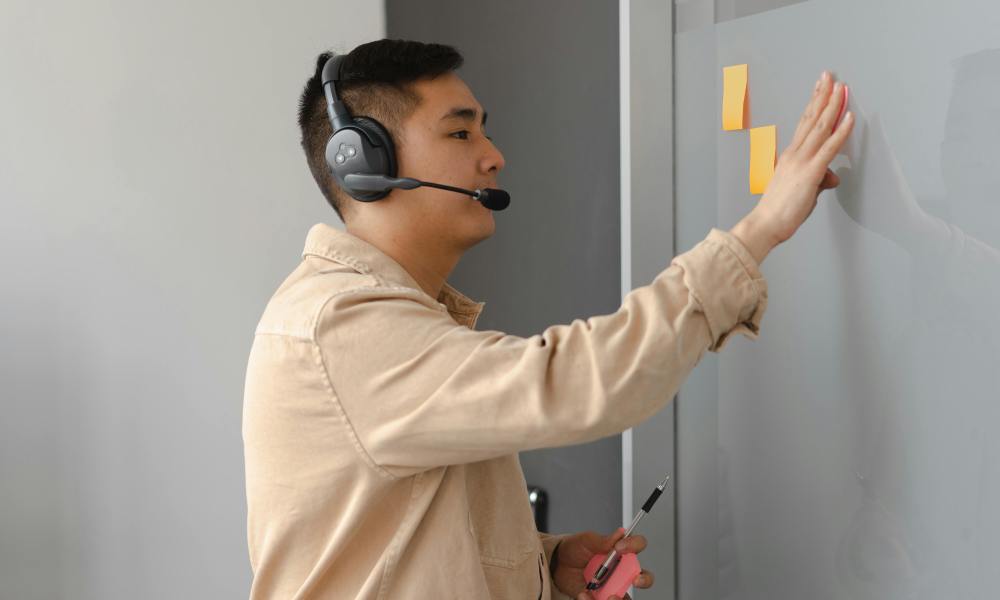 man wearing phone headset man wearing phone headset