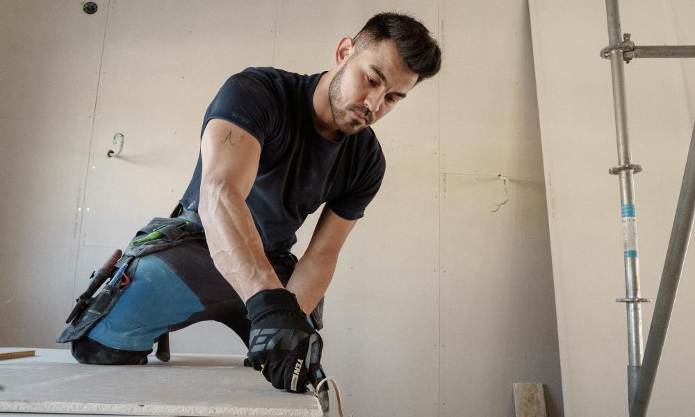 man working wearing gloves