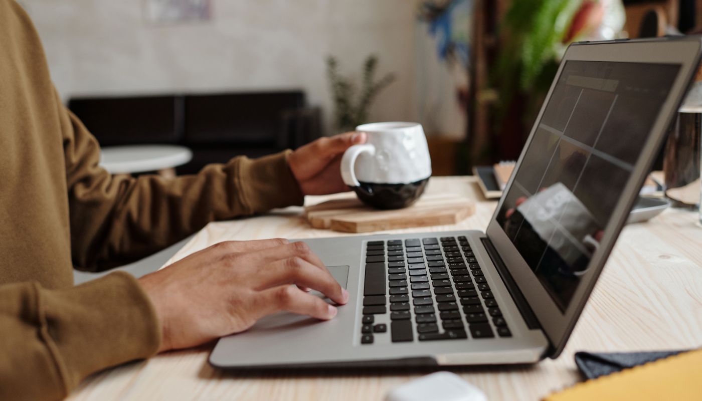 Man at desk using a laptop