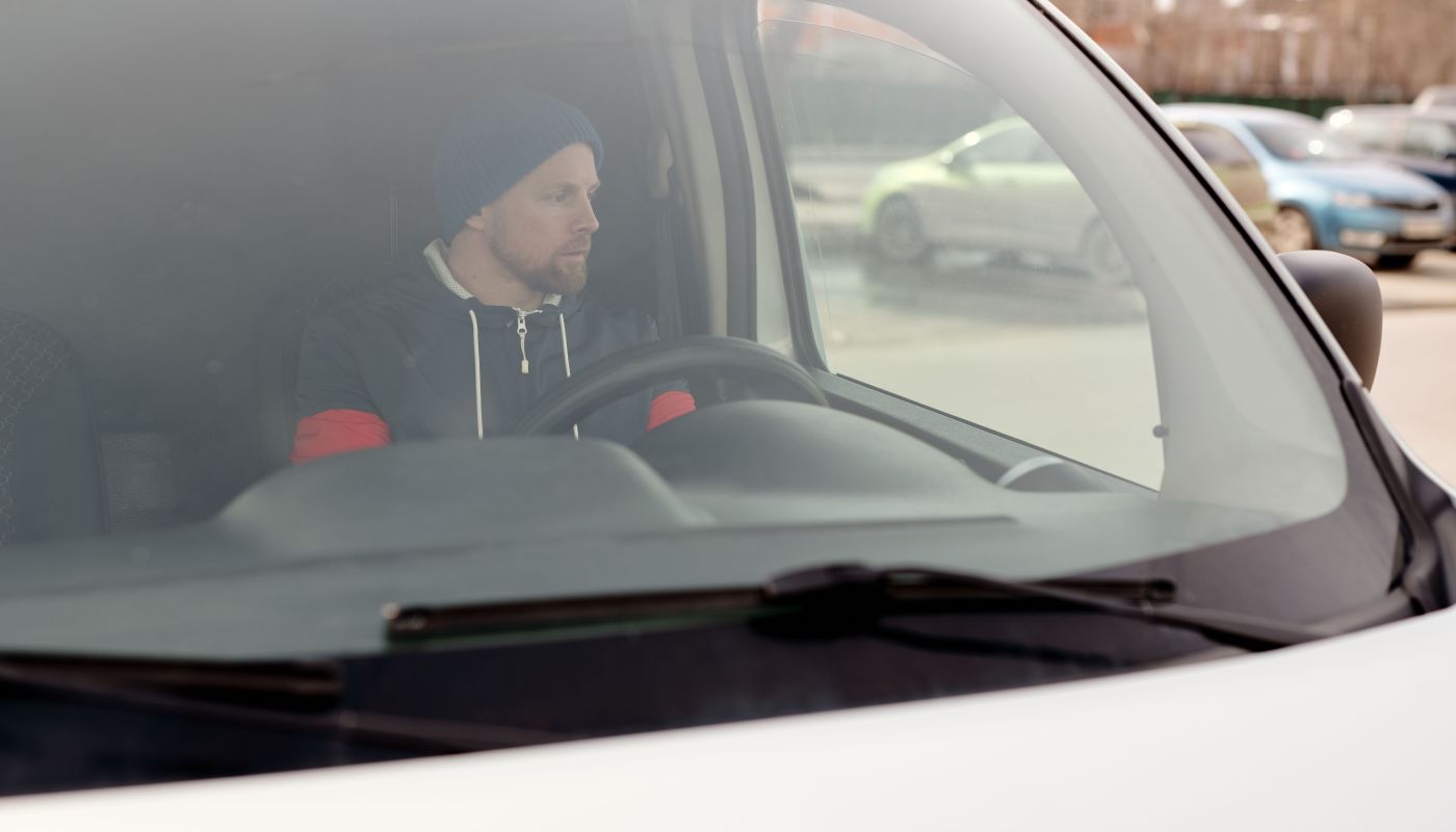 Man driving work van