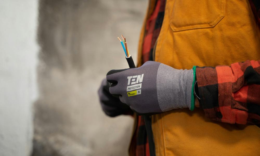 electrician with work gloves