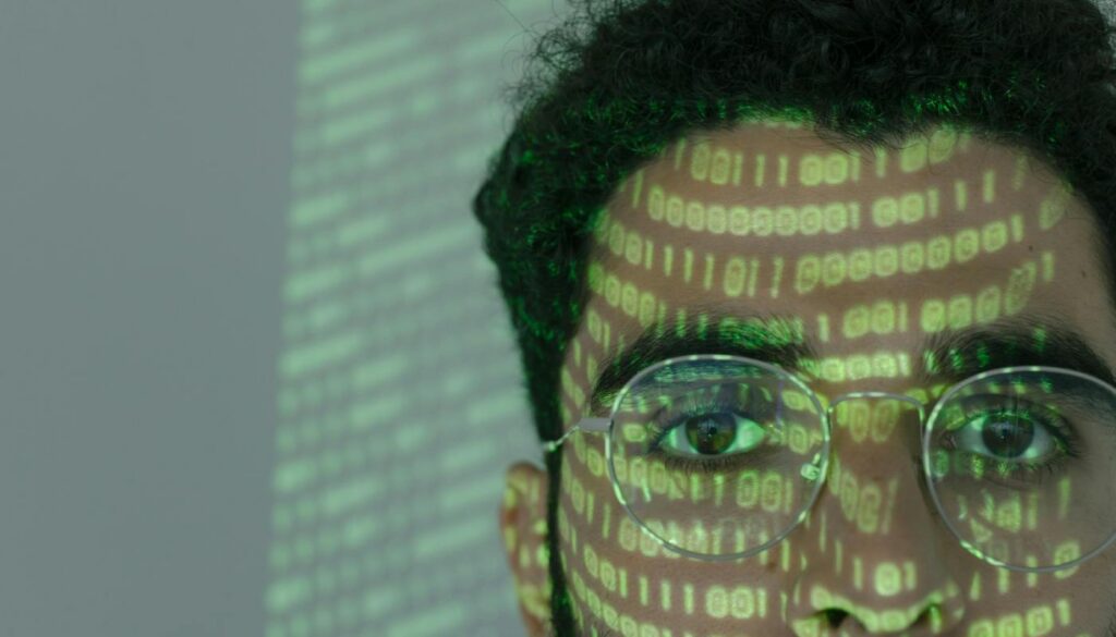man with binary code on face